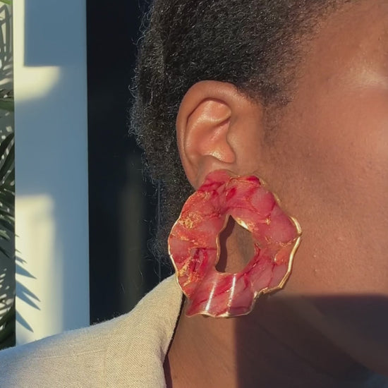 Woman wearing fall inspired handmade earrings