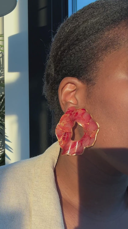 Woman wearing fall inspired handmade earrings